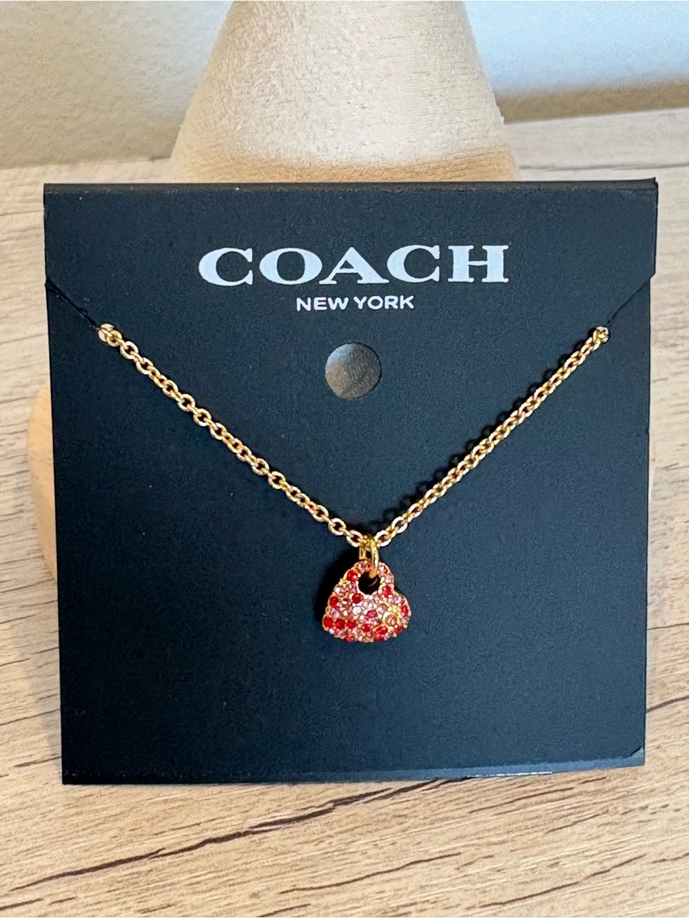 Coach Rose Gold-Tone Necklace with Red Crystal Padlock Charm